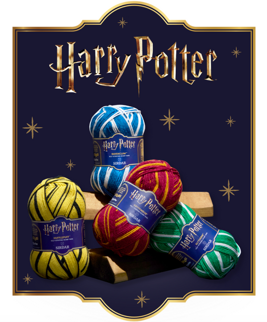 Four Harry Potter branded yarn skeins arranged on small wooden blocks against a dark navy background with gold stars and the Harry Potter logo. The yarn colors include yellow and black, blue and white, red and gold, and green and white.