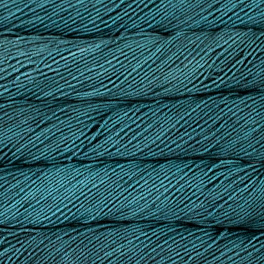 Seis Cabos by Malabrigo. Close-up of teal yarn with a textured surface