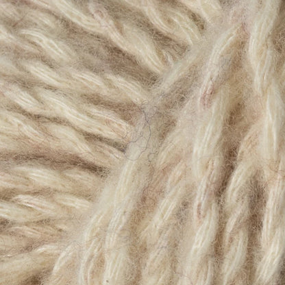 Flax: Berroco Stratto yarn close-up in cream and beige, showing its fluffy texture
