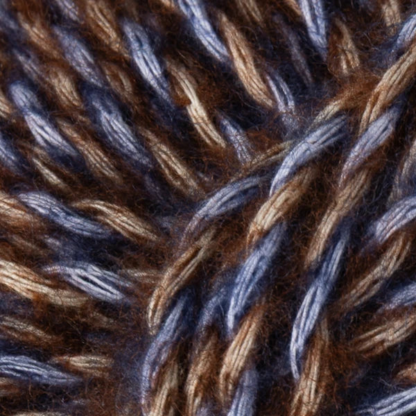 Dusk:  Berroco Stratto yarn close-up with blue and brown marled strands and a fuzzy texture.