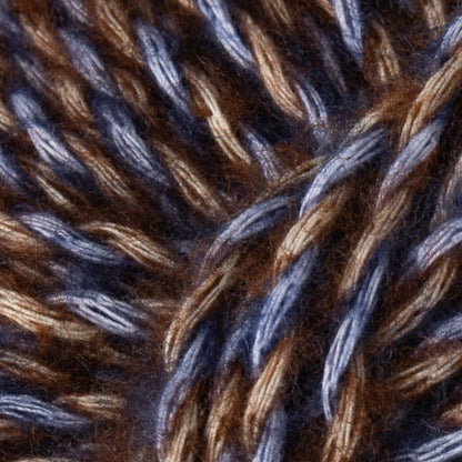 Dusk:  Berroco Stratto yarn close-up with blue and brown marled strands and a fuzzy texture.