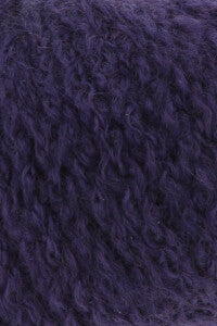 Purple: “Lang Yarns Cashmere Light yarn in purple 0090, close-up showing its fuzzy texture.”