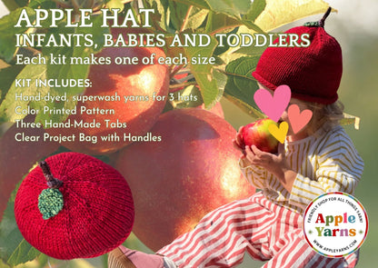 Apple Hat Kit: Promotional graphic for an 'Apple Hat' knitting kit for infants, babies, and toddlers. The image shows a child wearing a red knit apple hat, holding an apple, with a second red knit apple hat shown in the foreground.