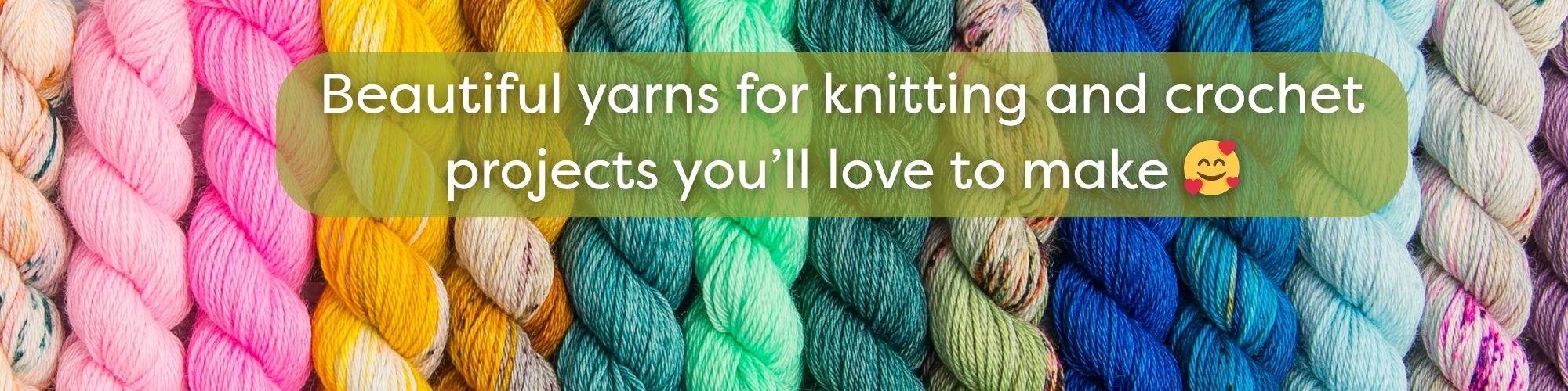 Colorful hand-dyed yarn skeins for knitting and crochet projects at Apple Yarns