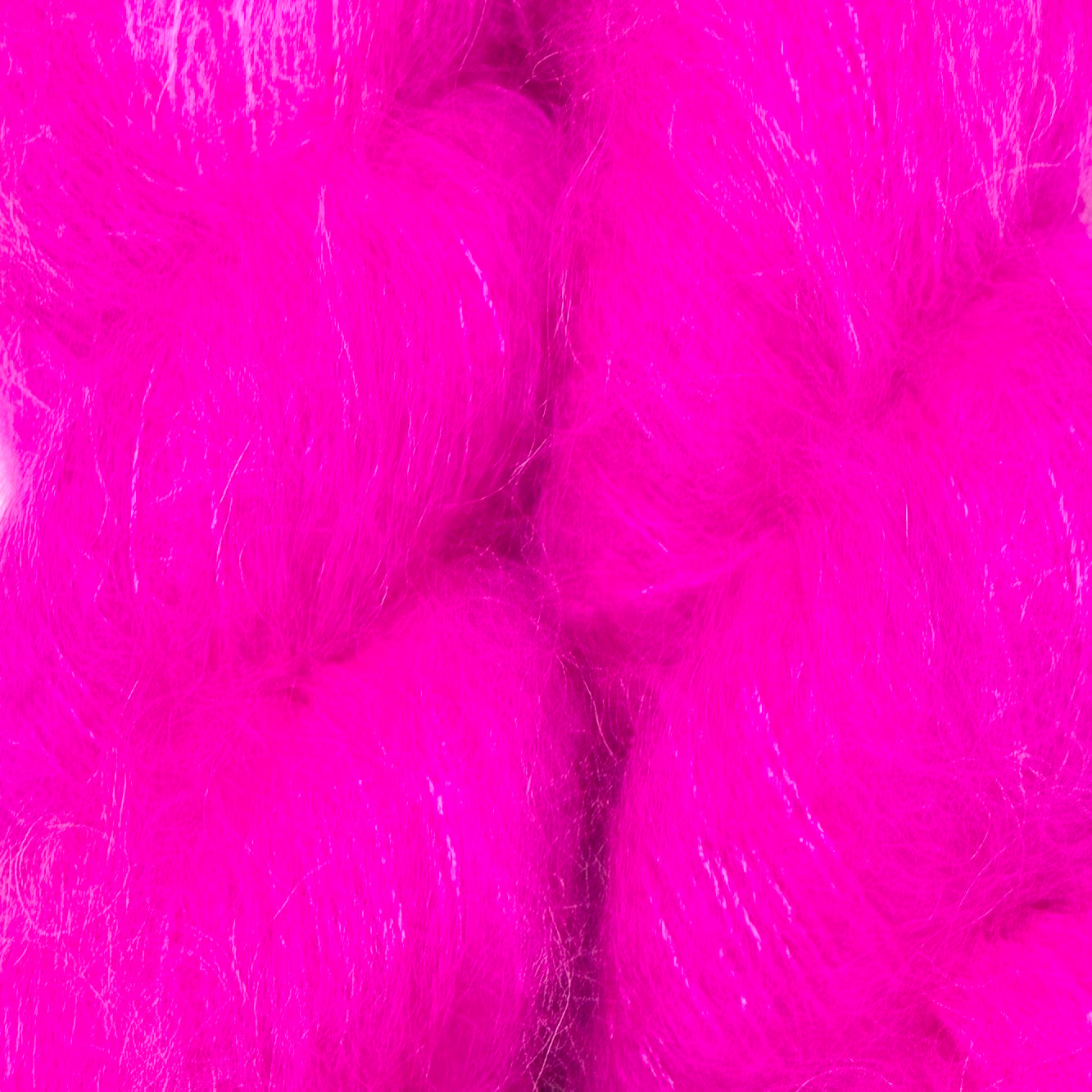 Bright hot pink fluffy faux fur or fiber texture filling the frame. Hand-dyed Cortland by Apple Fiber Studio in Alpaca and Silk at Apple Yarns.