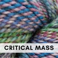 This is a picture of hand-spun yarn with the colors pink, green, blue, and yellow.