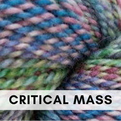 This is a picture of hand-spun yarn with the colors pink, green, blue, and yellow.