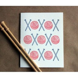 Yarn balls and needles